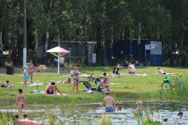 Выживание в жару: фоторепортаж с пляжей Нижнего Новгорода - фото 77